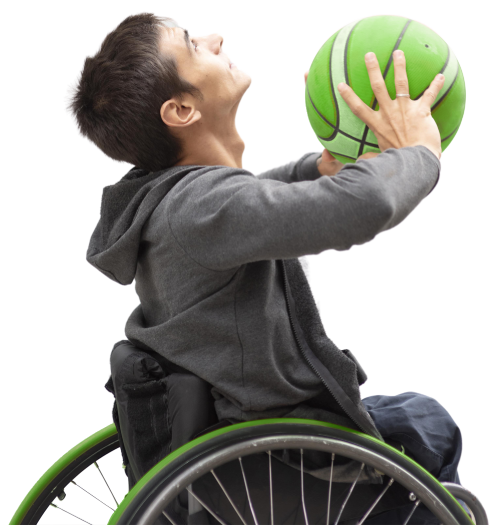 Wheelchair user with basketball in hand