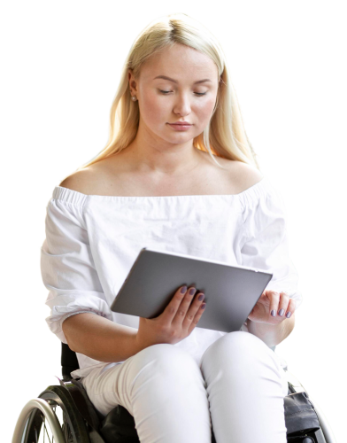 Woman sitting in a wheelchair using using a tablet